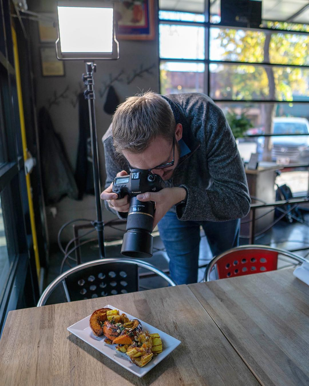 Eleven-08 Media photographer capturing a plated dish on location in Bend, Oregon