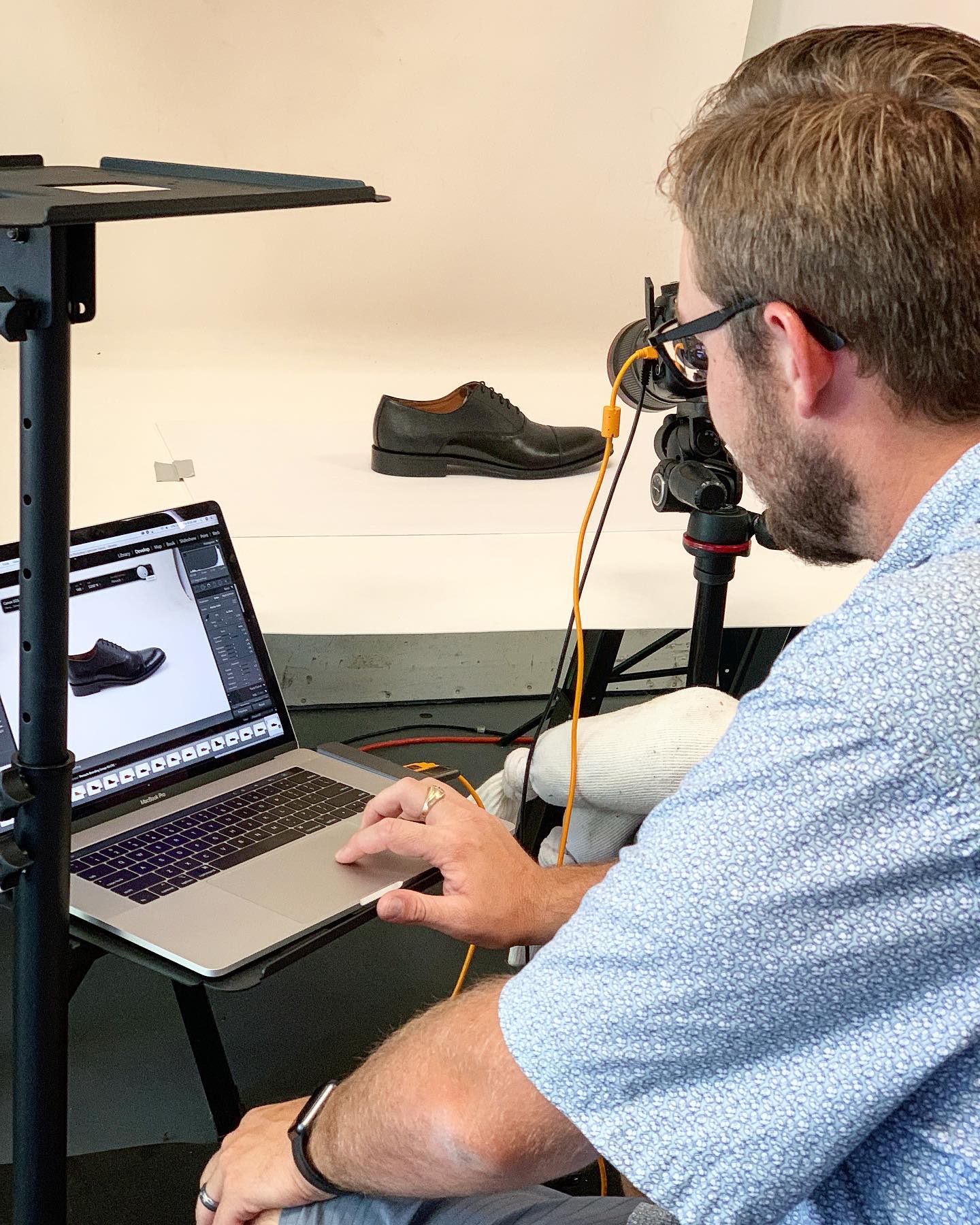 Kyle tethered shooting a shoe on a product set