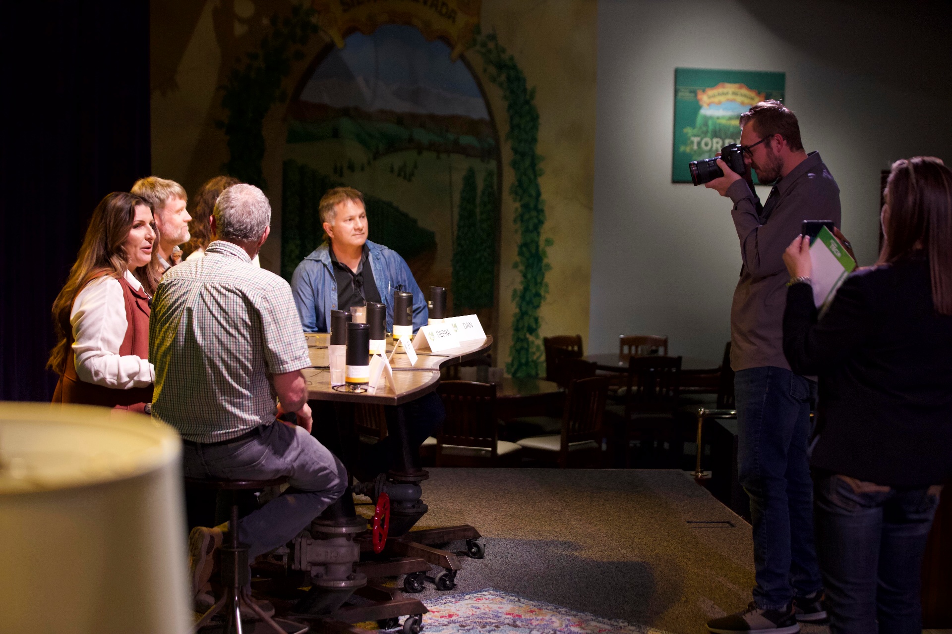 Kyle photographing a panel discussion at Sierra Nevada Brewing