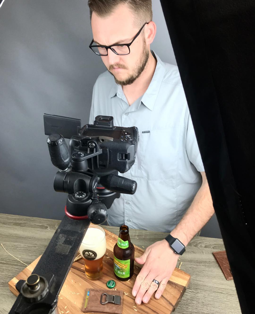 Kyle composing a product shot on tripod